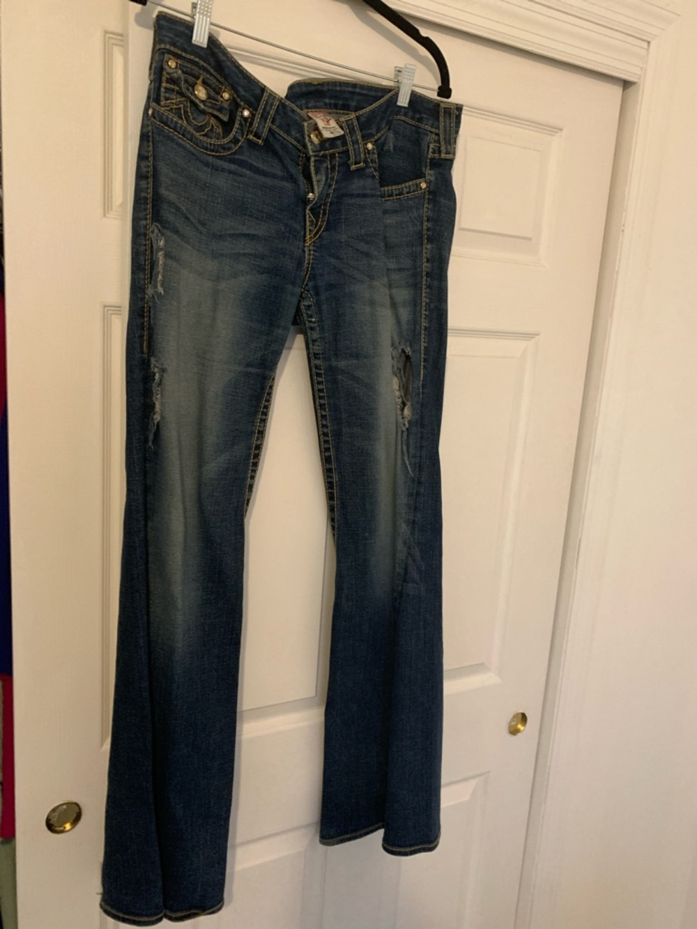 True Religion Dark Blue Flare Jeans with Distressed Details